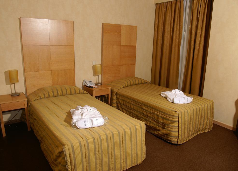 Hotel Lozenge Atenas Habitación foto