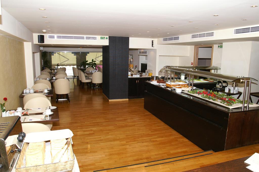 Hotel Lozenge Atenas Restaurante foto